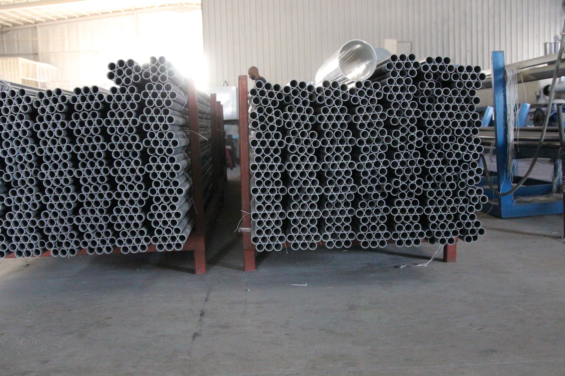 Industrial pipe racks on the ALFA factory floor